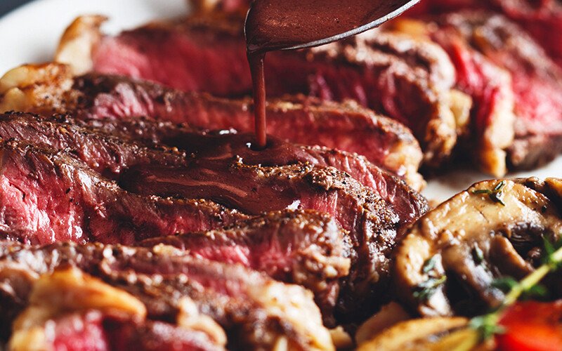 Broiled Grass-Fed Ribeye with Red Wine Mushrooms & Peppers